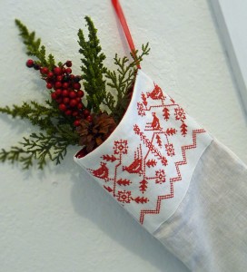 Embroidered Christmas stockings are another way of adding some spark into your plain stockings. Photo Credit: http://1.bp.blogspot.com/-Gn5wBnbkW34/UIxn1pUMxjI/AAAAAAAAAWo/vjR9CIVJJ5Y/s1600/stockingredworkbirdlargecuff1000pxwide.jpg